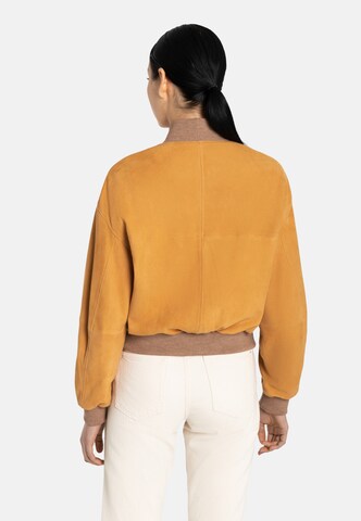 Werner Christ Between-season jacket in Orange