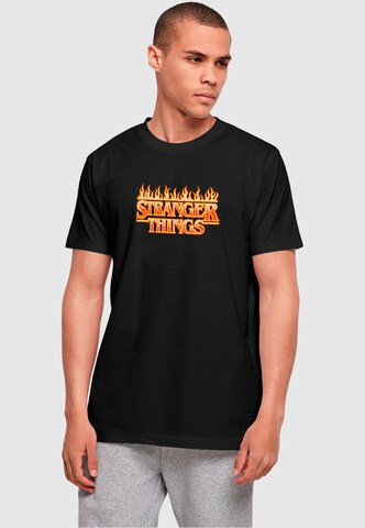 ABSOLUTE CULT Shirt 'Stranger Stranger Things - Fire' in Black: front