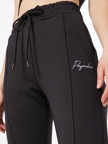 Wide leg Pantaloni 'Valia' di Pegador in nero