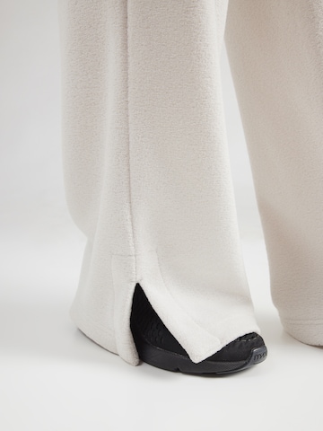 Nike Sportswear Wide leg Broek 'PHNX' in Beige