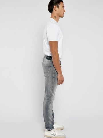 Goldgarn Slimfit Jeans i grå