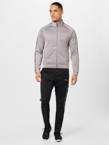 Champion Authentic Athletic Apparel Tracksuit in Grey: front