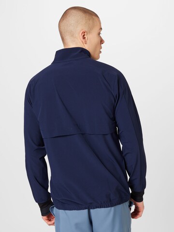 ASICS - Chaqueta deportiva en azul