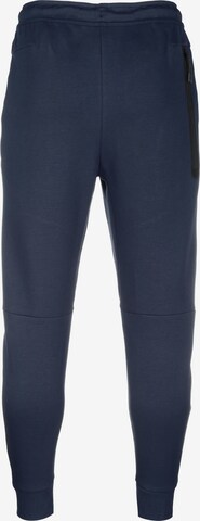 Tapered Pantaloni di Nike Sportswear in blu