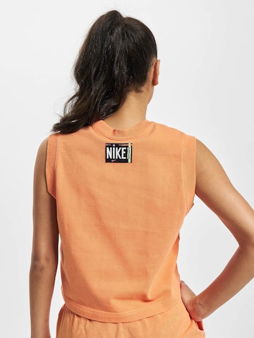 Top di Nike Sportswear in arancione