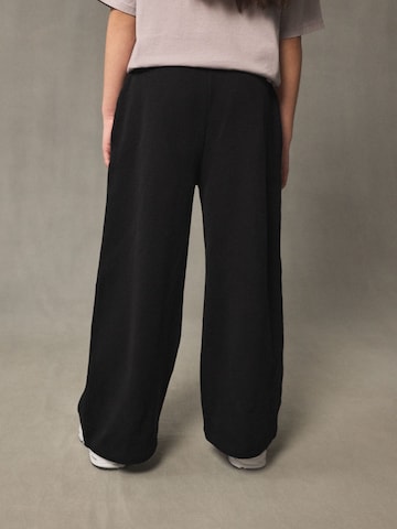 Wide leg Pantaloni di Next in nero