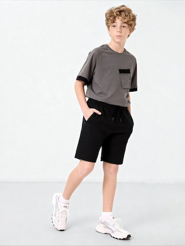 Tommy Life tavaline Püksid 'TOMMY Jugend-Shorts Aus Baumwollmischung', värv must