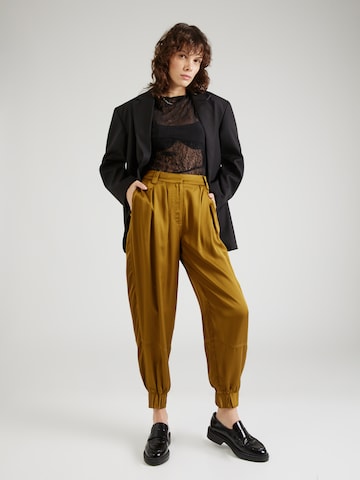 Masai Tapered Pleat-Front Pants 'Pali' in Brown
