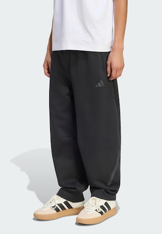 ADIDAS SPORTSWEAR - Pierna ancha Pantalón deportivo 'Z.N.E.' en negro: frente