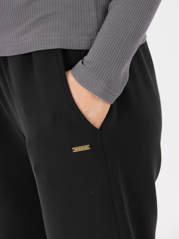 Athlecia Дънки Tapered Leg Спортен панталон 'Jillnana V2' в черно