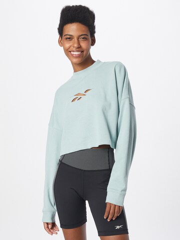 Reebok - Sweatshirt de desporto em cinzento: frente