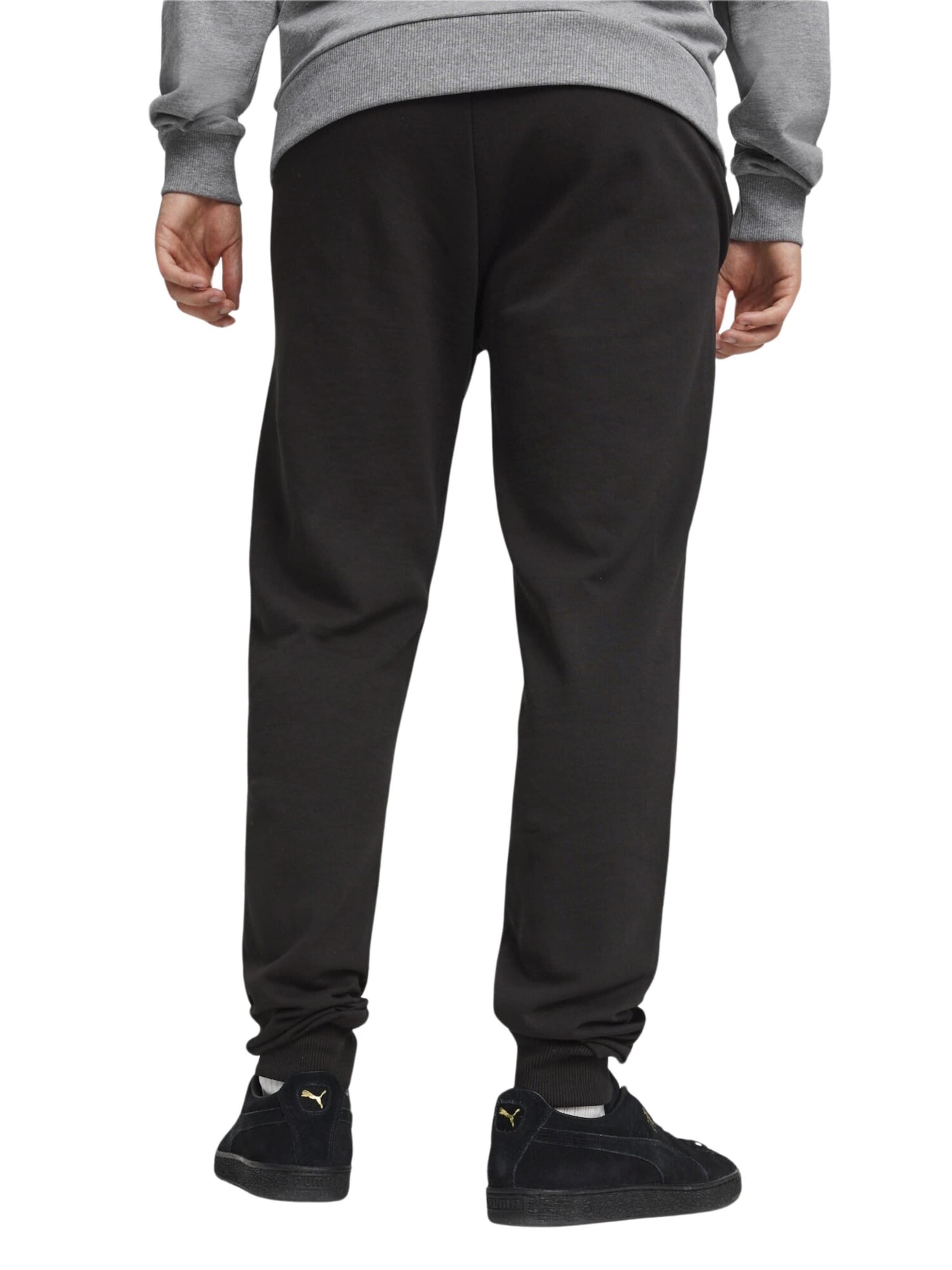 Effilé Pantalon de sport 'TeamGoal' PUMA en noir