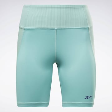 Reebok Skinny Sportovní kalhoty 'Les Mills' – modrá