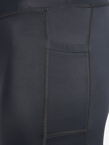 Skinny Pantalon de sport Hummel en gris