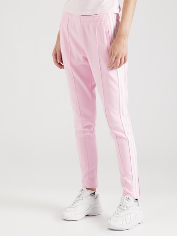 ADIDAS ORIGINALS - Slimfit Calças 'Adicolor Sst' em rosa: frente