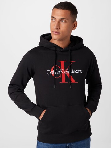 Calvin Klein Jeans - Sweatshirt em preto: frente