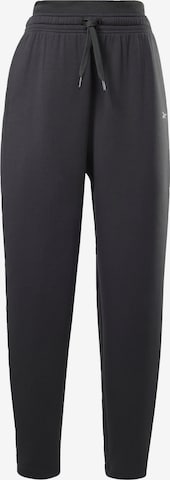 Effilé Pantalon de sport Reebok en noir : devant