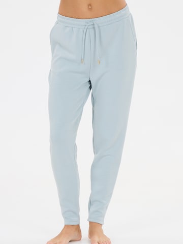 Athlecia - Tapered Pantalón deportivo 'Jacey' en azul: frente