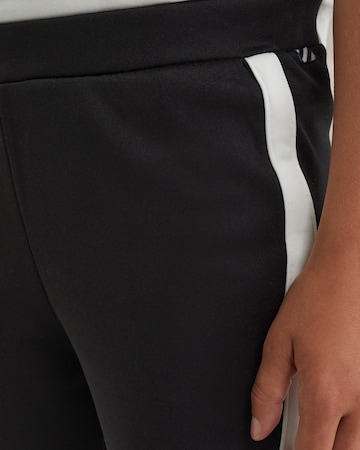 WE Fashion Rozkloszowany krój Legginsy w kolorze czarny