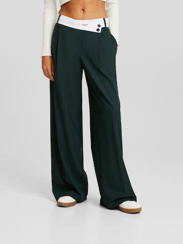 Bershka Wide leg Pleat-front trousers in Green: front