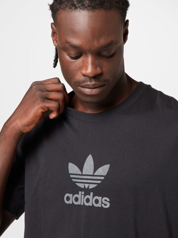 ADIDAS ORIGINALS - Camiseta 'Trefoil Series Street' en negro