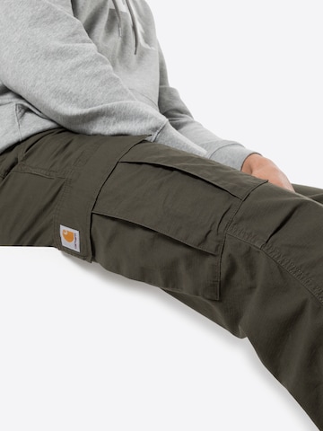 Regular Pantaloni cu buzunare de la Carhartt WIP pe verde