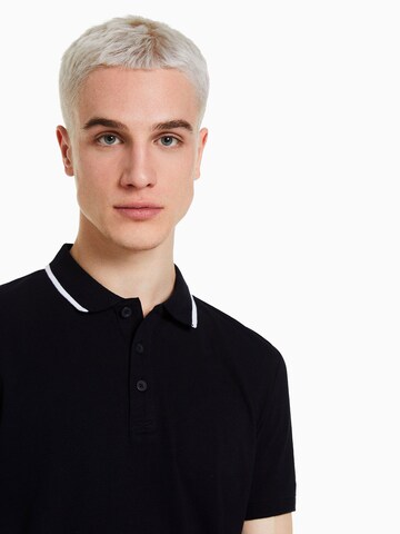 Bershka Poloshirt in Schwarz