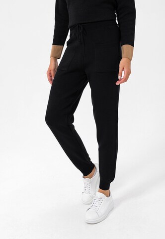 Jimmy Sanders Tapered Pants in Black: front