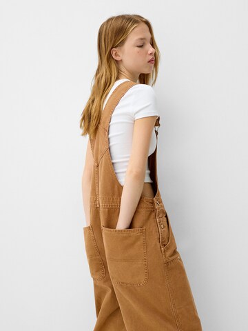 Bershka Loose fit Dungaree jeans in Brown