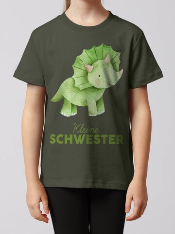 T-Shirt 'Dinosaurier 01 Kleine Schwester' watabout.kids en vert : devant