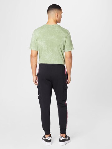 Effilé Pantalon cargo Nike Sportswear en noir