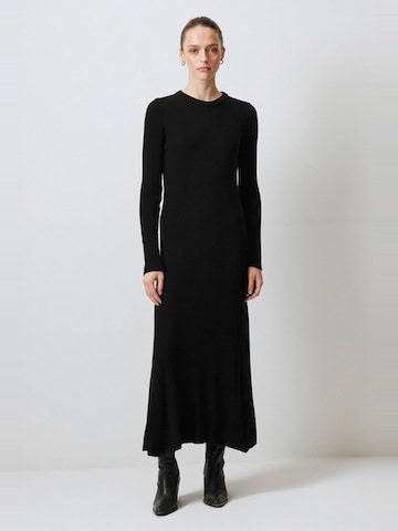 Touche Prive Dress in Black: front