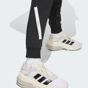 ADIDAS SPORTSWEAR Tapered Sports trousers 'Z.N.E.' in Black