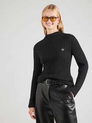 Pull-over Calvin Klein Jeans en noir : devant