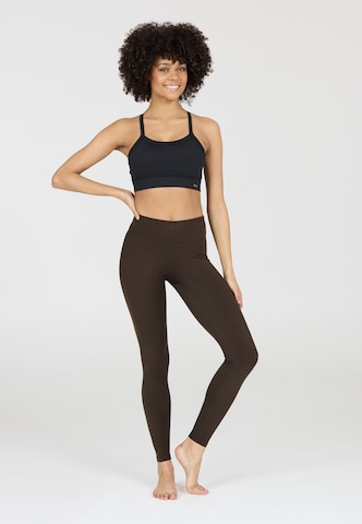 Athlecia Skinny Tights 'Luxe' in Braun