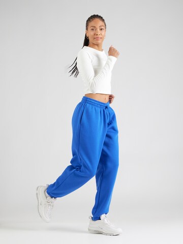 Nike Sportswear Loosefit Kalhoty 'Phoenix Fleece' – modrá