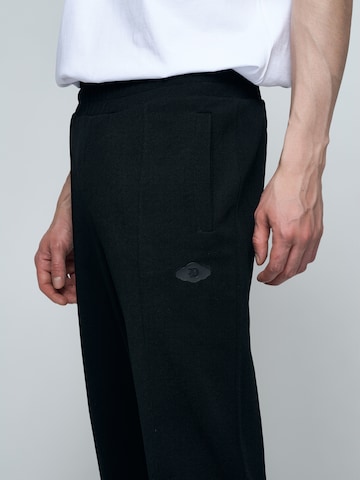 Bless my Demons exclusive for ABOUT YOU Loose fit Pants 'MURUS' in Black