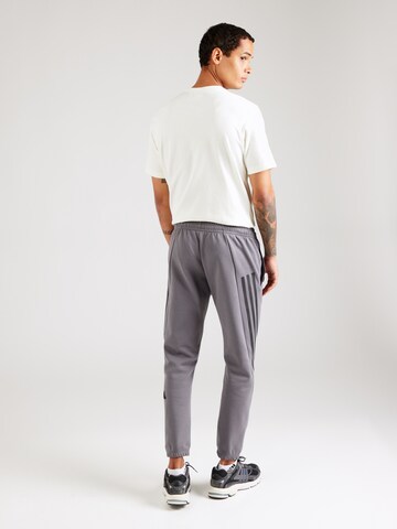 ADIDAS SPORTSWEAR Tapered Sports trousers 'Future Icons' in Grey