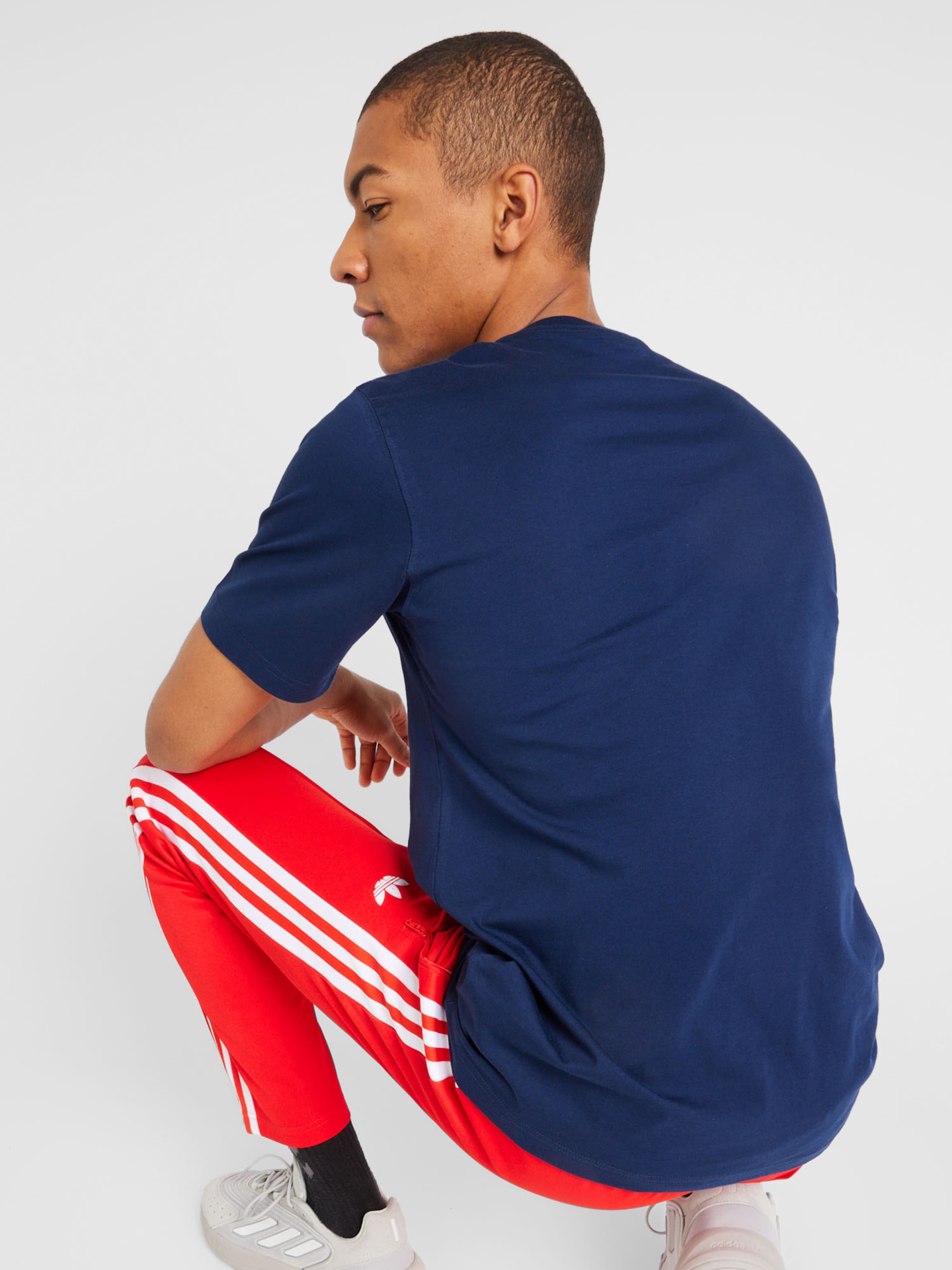 Adidas originals remera zapatillas top