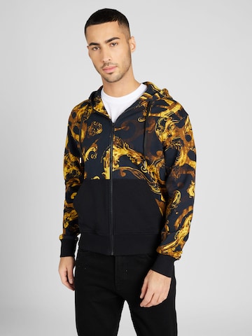 Veste de survêtement Versace Jeans Couture en noir : devant