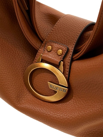 GUESS Schultertasche‌‌‌‌‌ in Braun