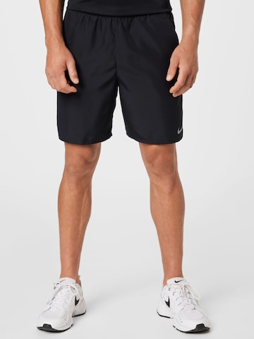 NIKE Regular Workout Pants in Black: front