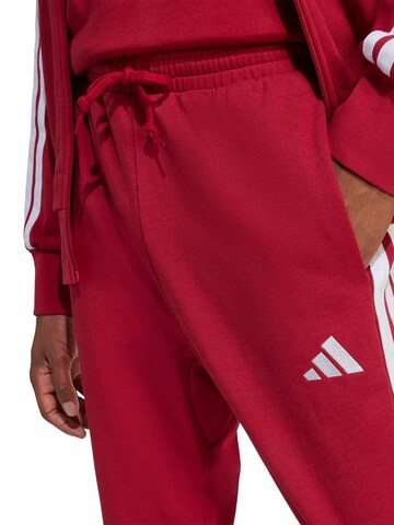 ADIDAS SPORTSWEAR Tapered Sportbroek 'Essential' in Bruin