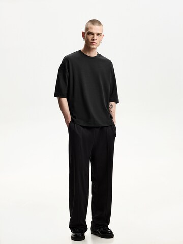 Loosefit Pantaloni di Bershka in nero: frontale