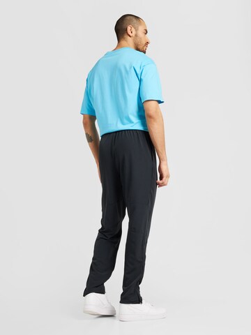 NIKE Loose fit Workout Pants 'Advantage' in Black