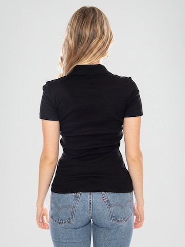 LACOSTE Koszulka 'Polo Shirt M/C 031 -- Women's Black Polo Shirt' w kolorze czarny