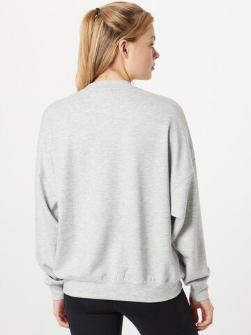 aim'n - Sweatshirt de desporto 'Comfy' em cinzento