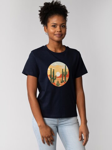 T-shirt 'Sonnenuntergang in der Wüste' Watapparel en bleu : devant