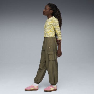 PUMA Performance shirt 'Bowtique' in Yellow
