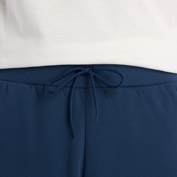 new balance - Regular Calças de desporto 'Post Season' em azul